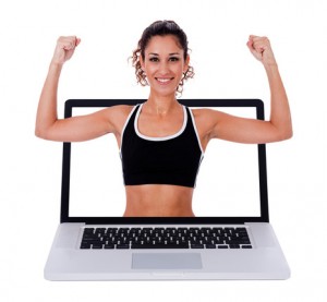 Fitness woman showing a exercises  position through laptop scree